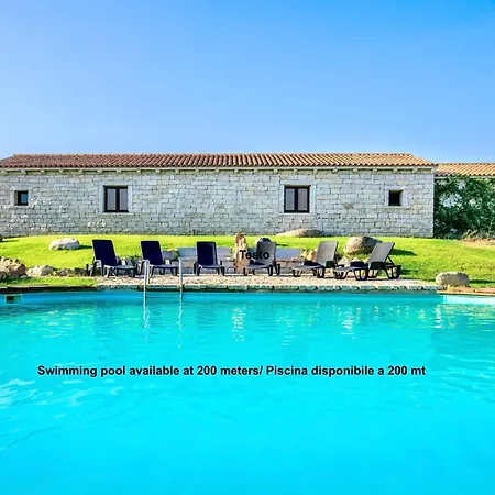 With Common Swimming-pool And Outdoor Private Area In Apartmanhotel Badesi
